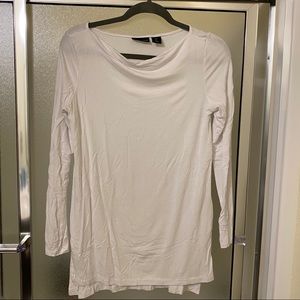 Long sleeve white top.
